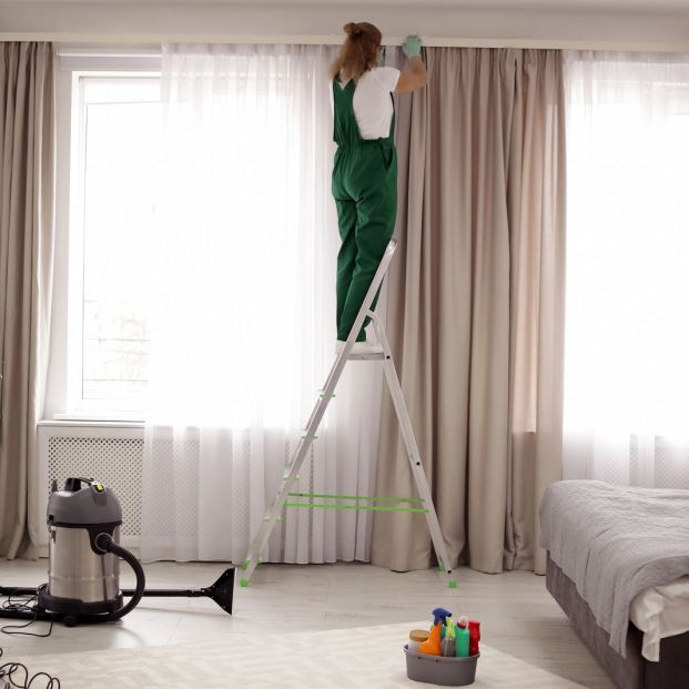 bigstock-professional-janitor-on-ladder-294183913_1_621x621